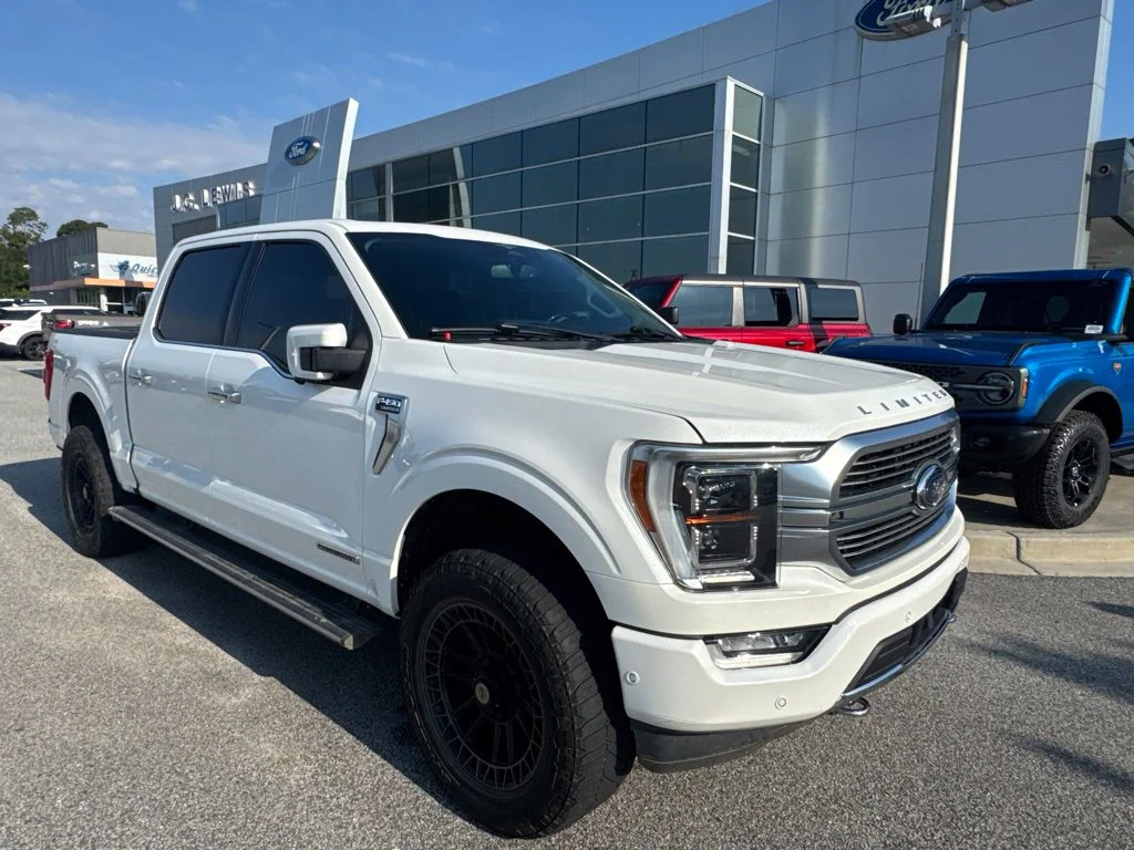 Used 2023 White Metallic Ford Limited image 1