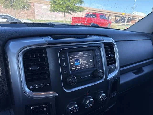 Used 2024 Granite Crystal Metallic Clearcoat RAM SLT 4x4 Quad Cab 6.3 ft. box 140 in. WB image 20