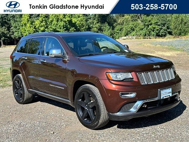 Used 2014 Deep Auburn Pearlcoat Jeep Summit image 1