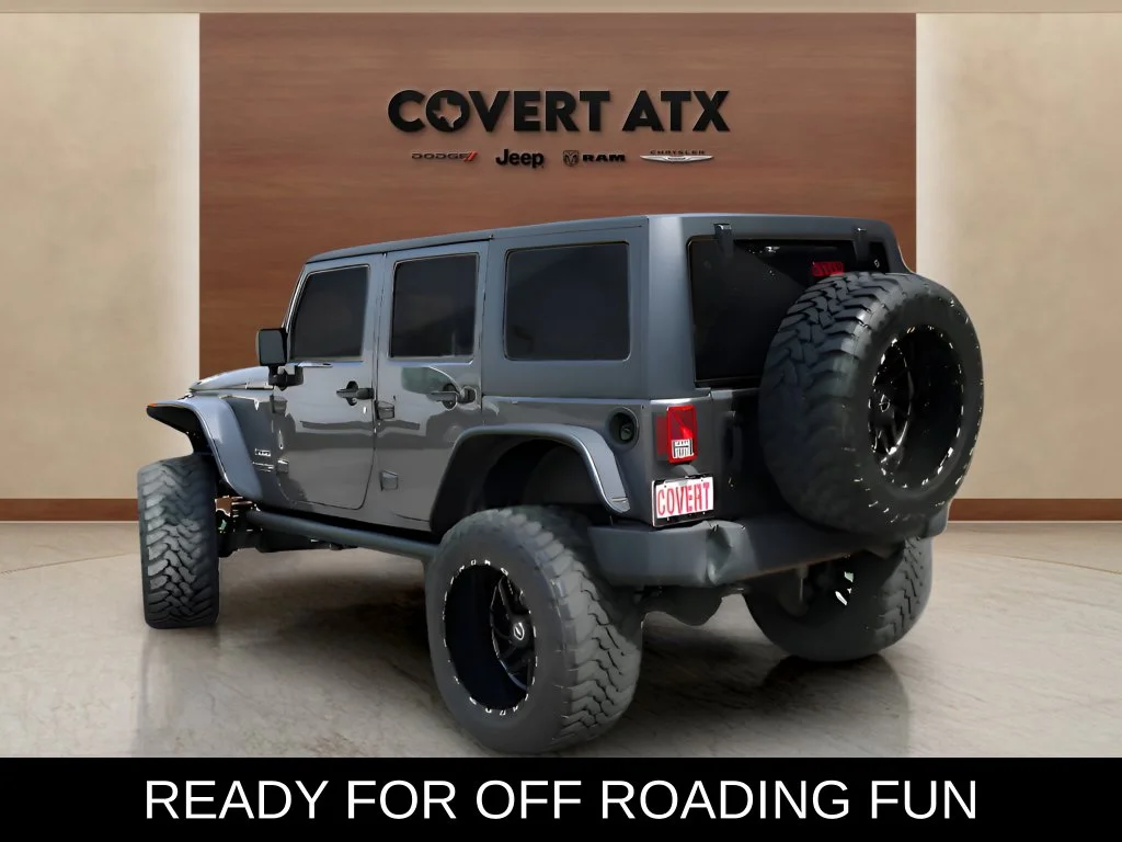 Used 2018 Gray Jeep Unlimited Sport image 3