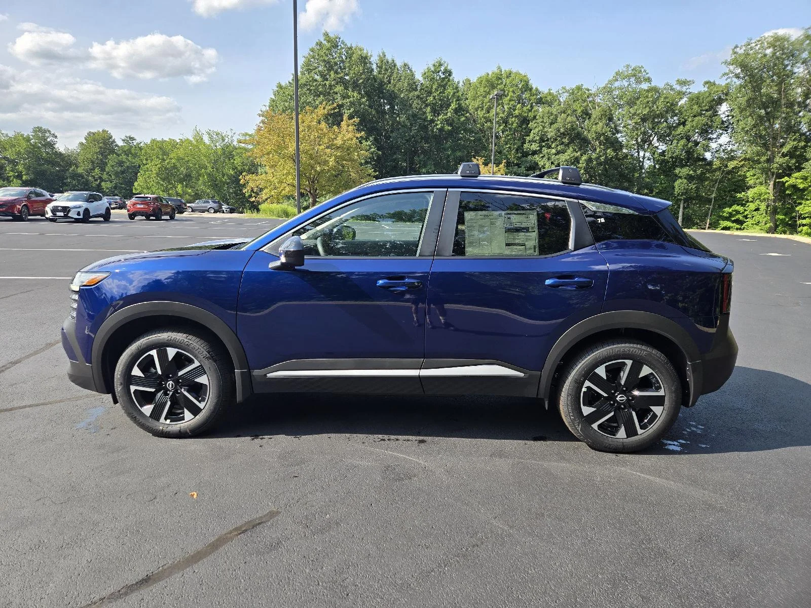 New 2026 Deep Blue Pearl Nissan SV image 5