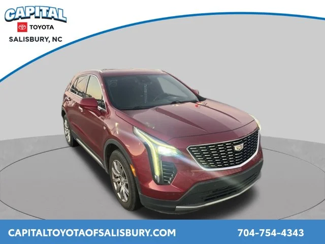 Used 2019 Red Cadillac Premium Luxury image 1