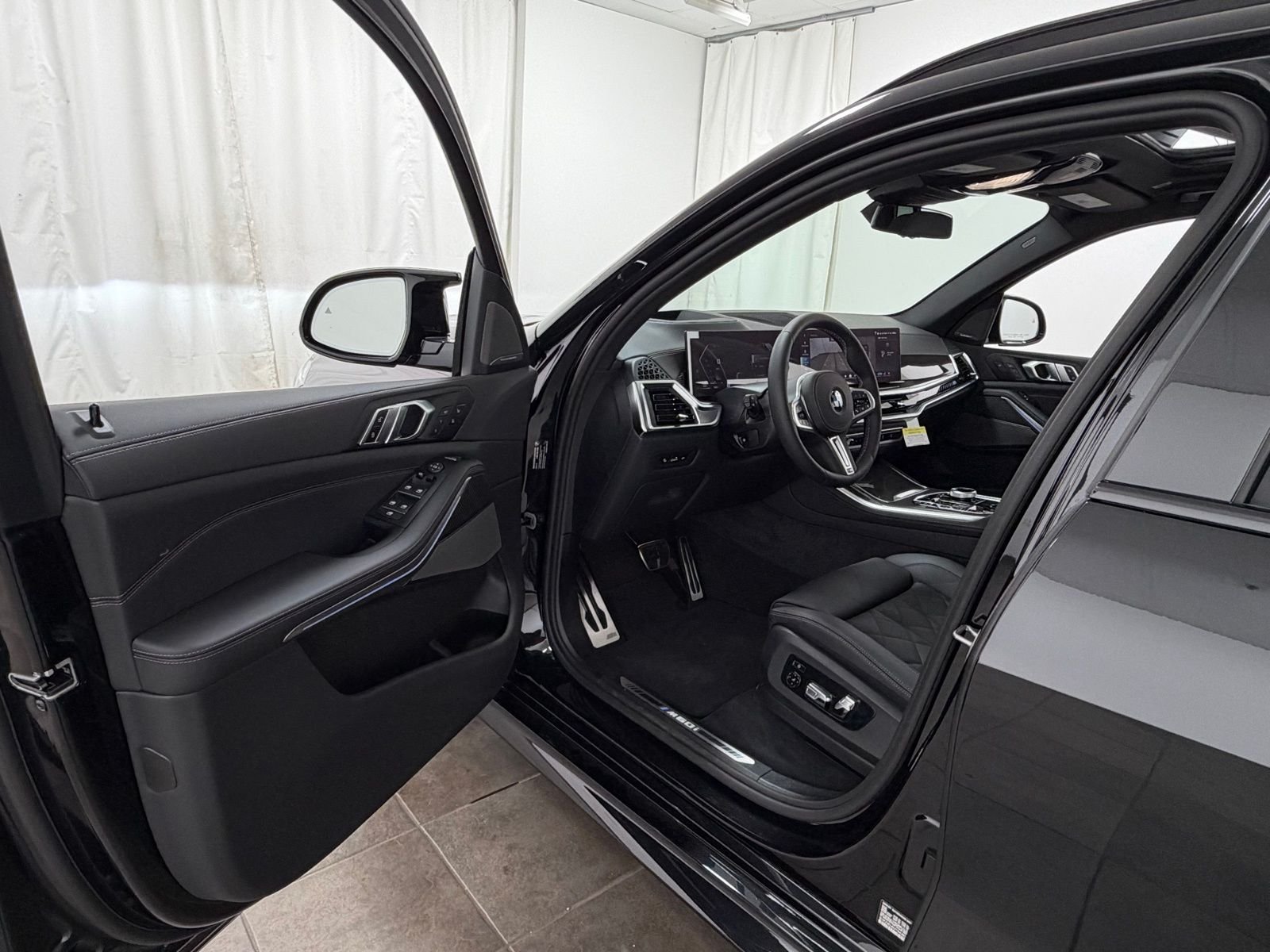 New 2026 Black Sapphire Metallic BMW M60i image 38