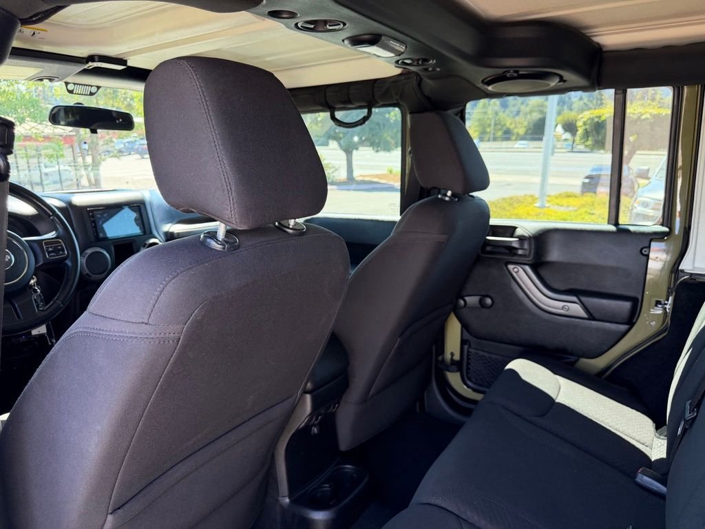 Used 2013 Commando Green Jeep Unlimited Sport image 29