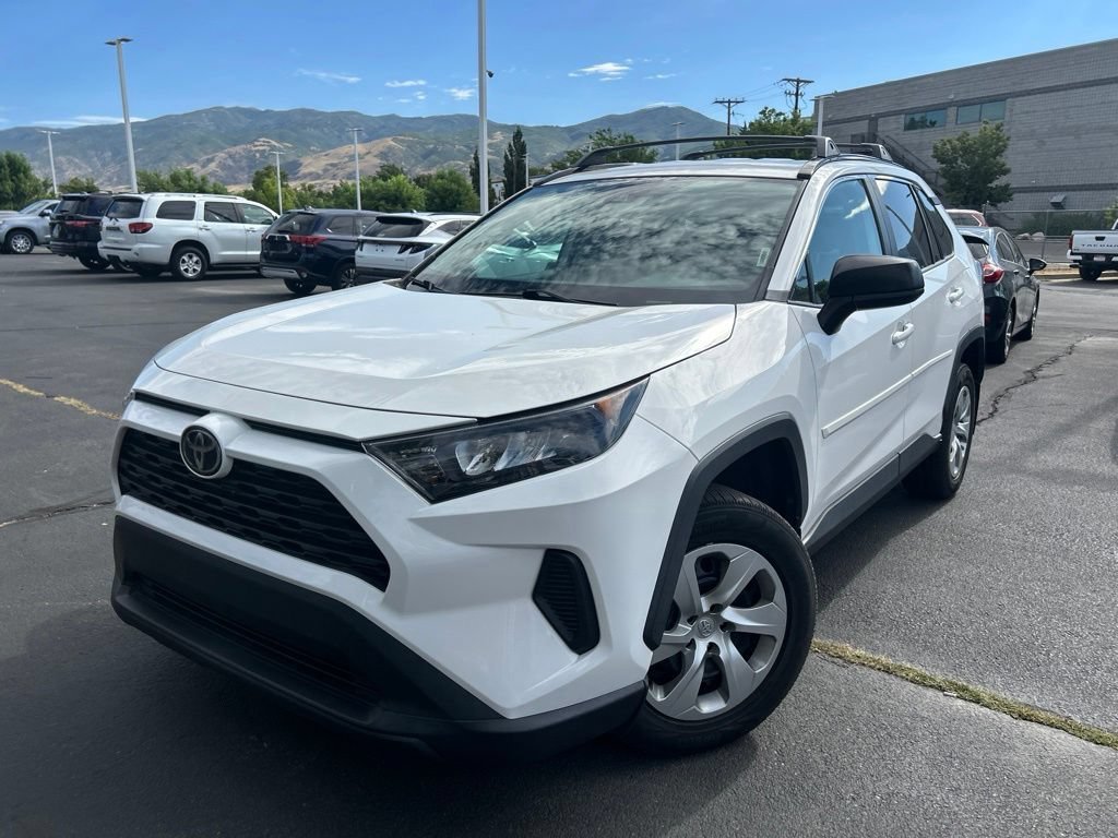 Used 2021 Super White Toyota LE image 14