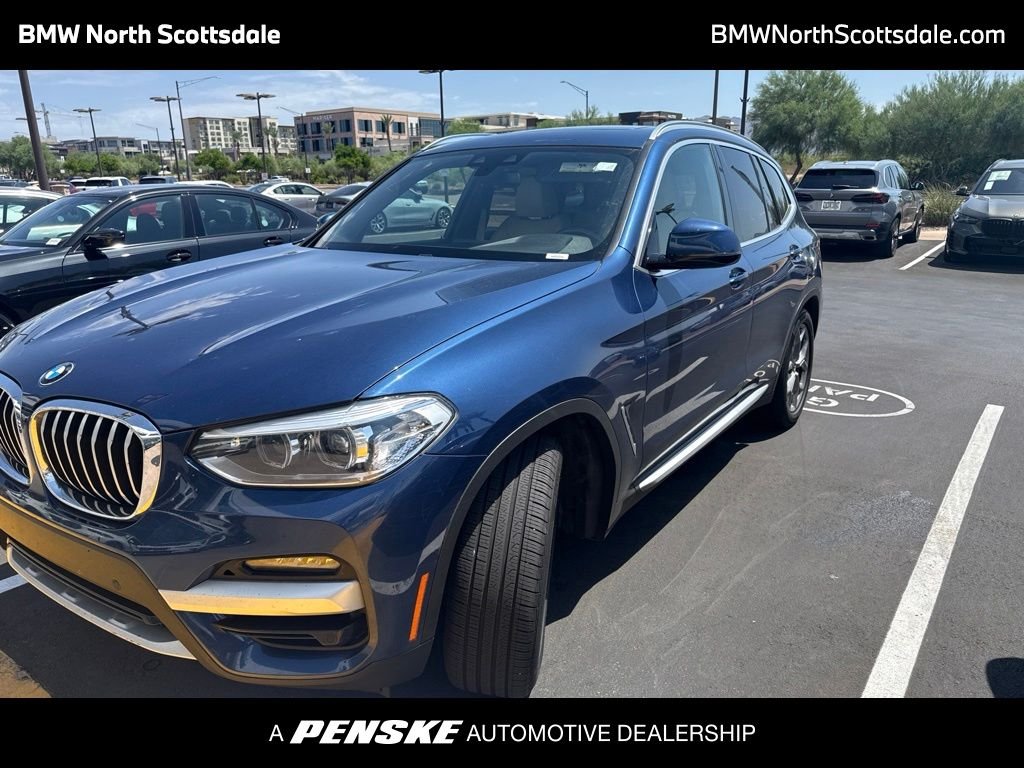 Used 2020 Blue Metallic BMW sDrive30i image 1