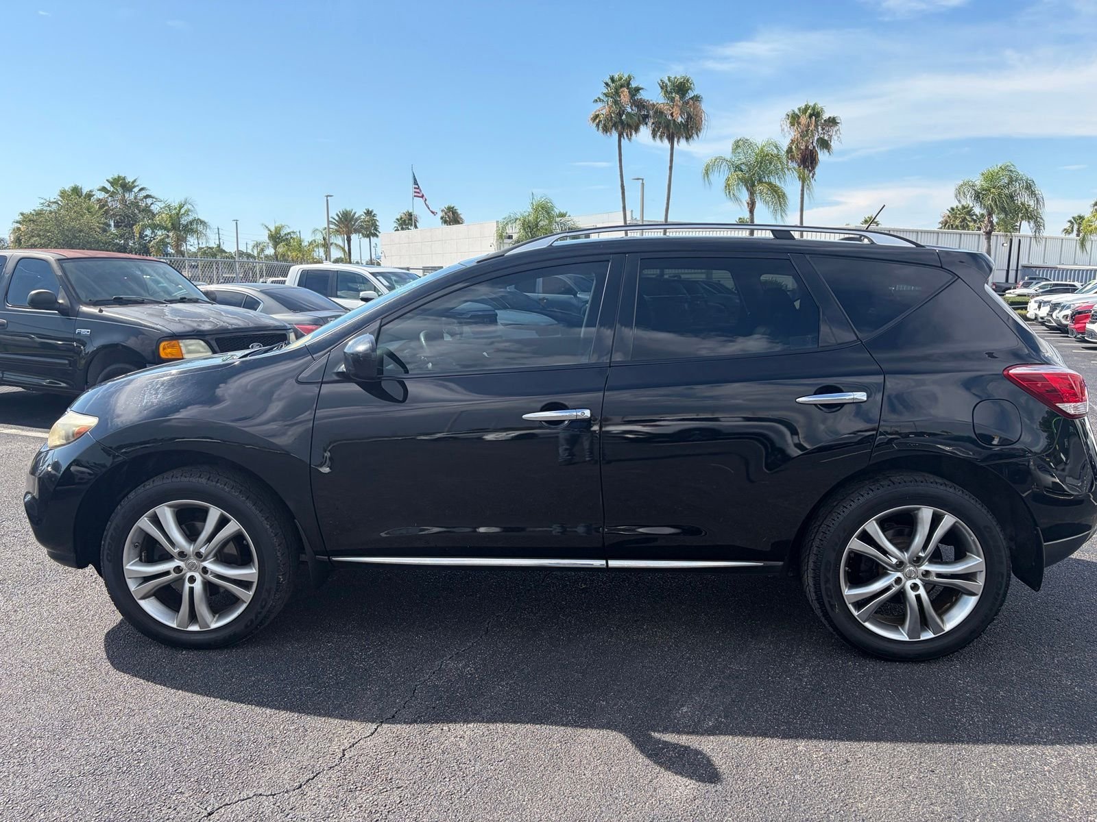 Used 2011 Black Nissan LE image 4