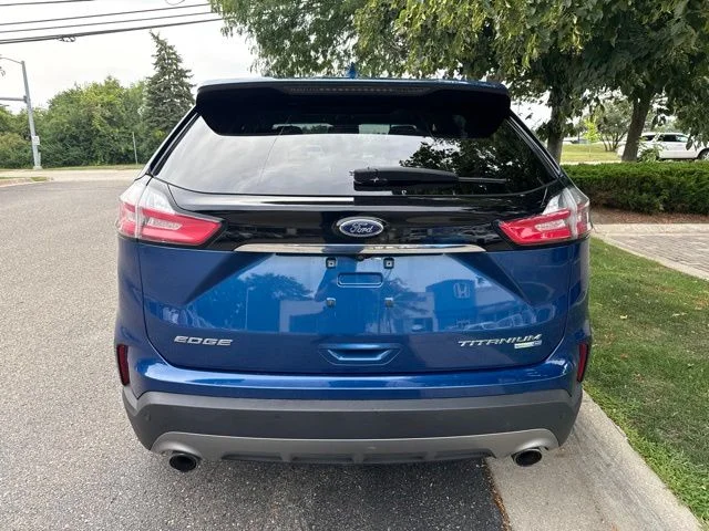 Used 2020 Blue Metallic Ford Titanium image 6
