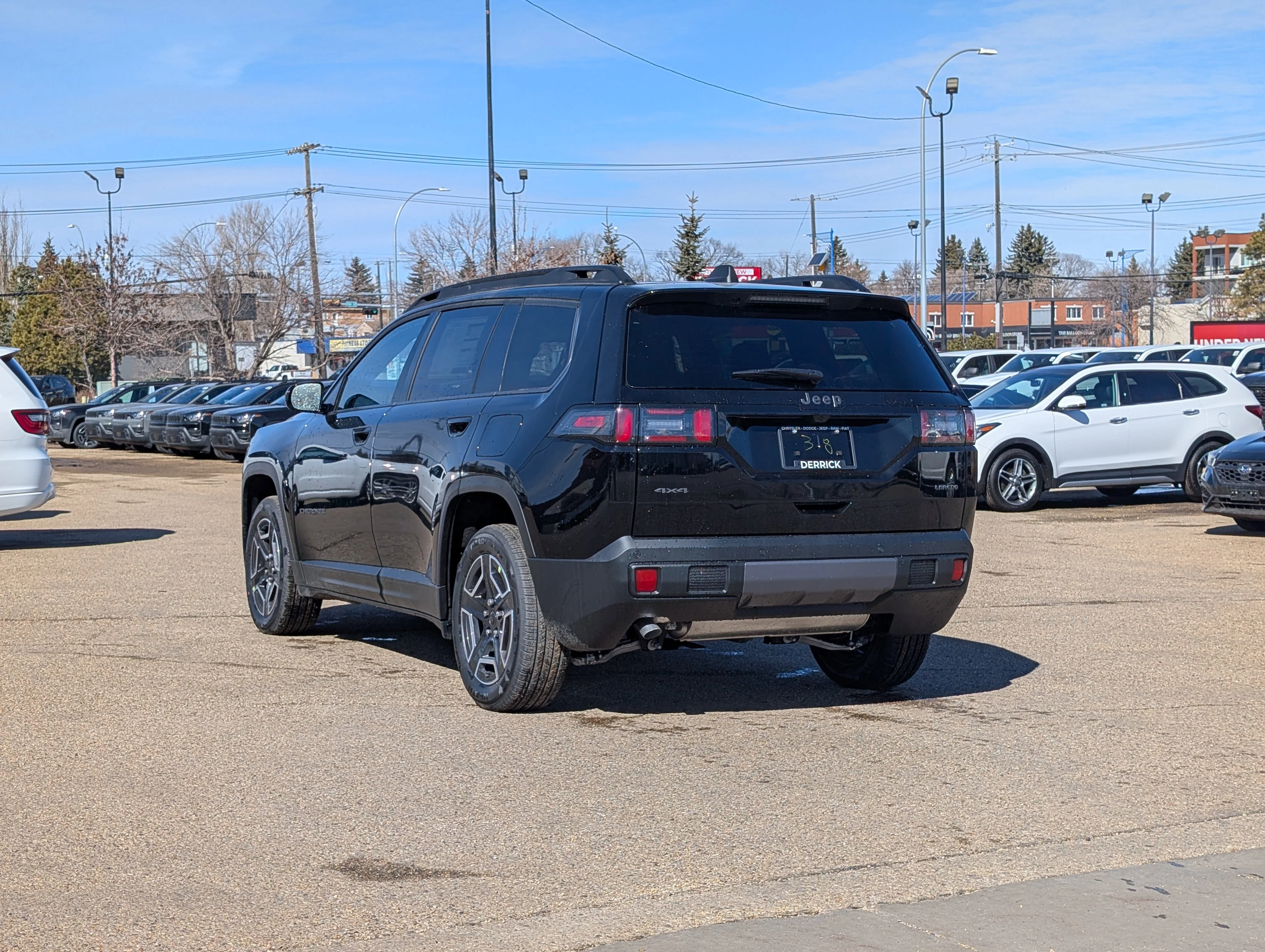 New 2026 Diamond Black Crystal Pearl Jeep Laredo image 4