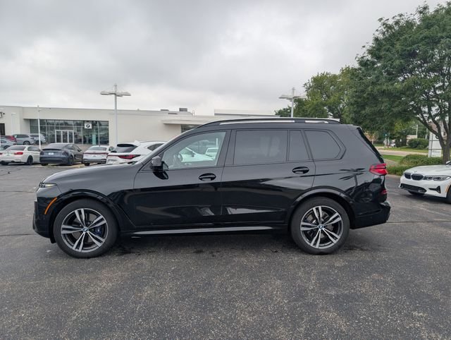 Certified Used 2025 Black Sapphire Metallic BMW xDrive40i image 1