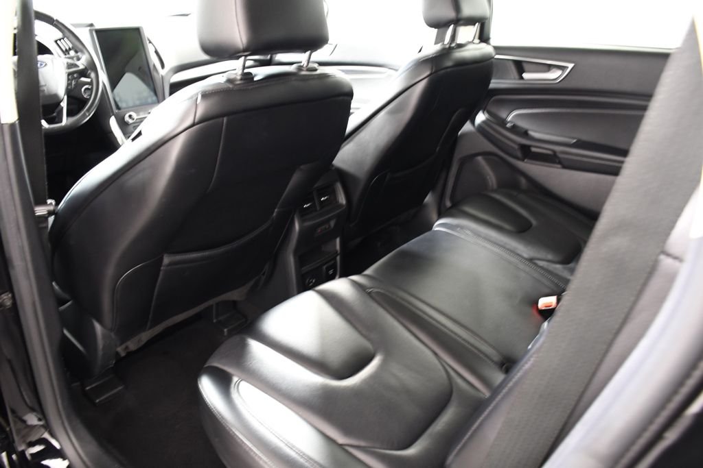 Used 2022 Agate Black Metallic Ford Titanium image 27