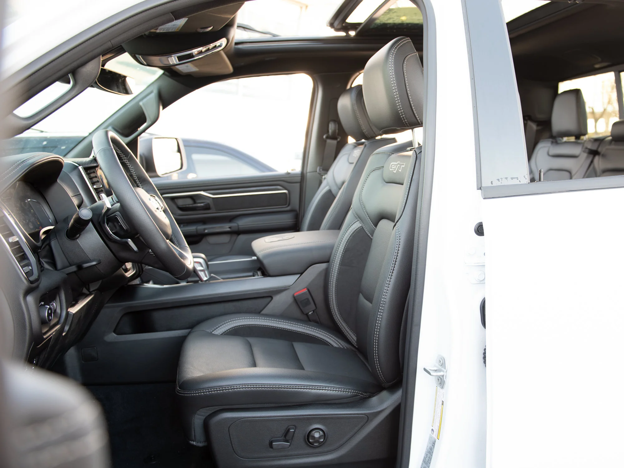 New 2026 White RAM Rebel G/T* Crew Cab 4x4, Pano Sunroof, Passive Cold End Exhaust, Passenger Screen image 24