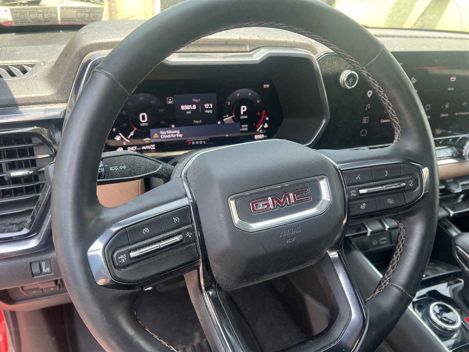 Used 2024 Volcanic Red Tintcoat GMC 4WD AT4 image 11