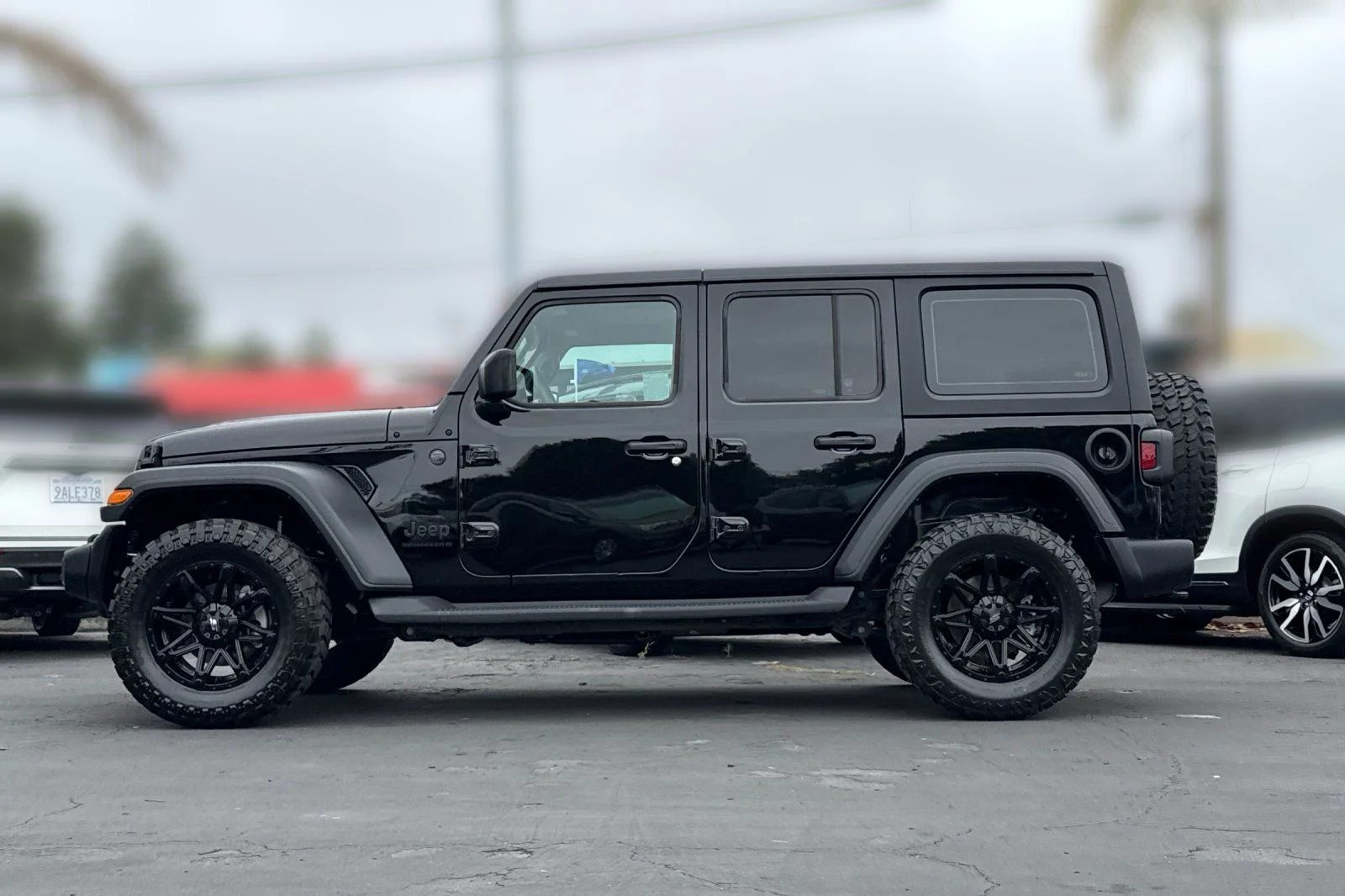Used 2024 Black Clearcoat Jeep Sport image 30