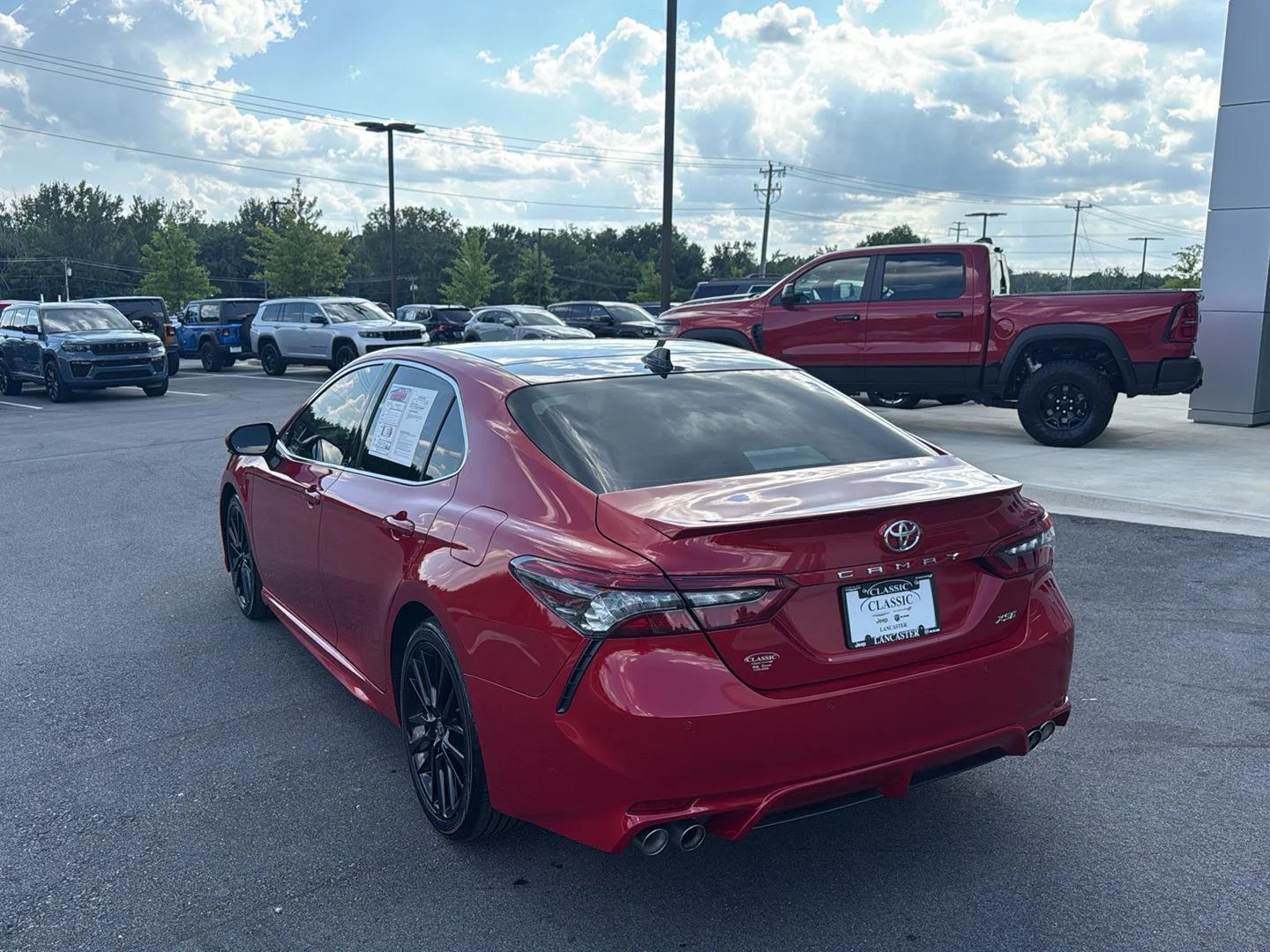 Used 2024 Supersonic Red Toyota XSE V6 image 8