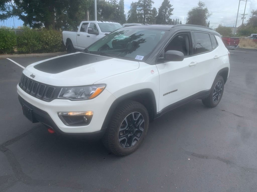 Used 2019 White Clearcoat Jeep Trailhawk image 1