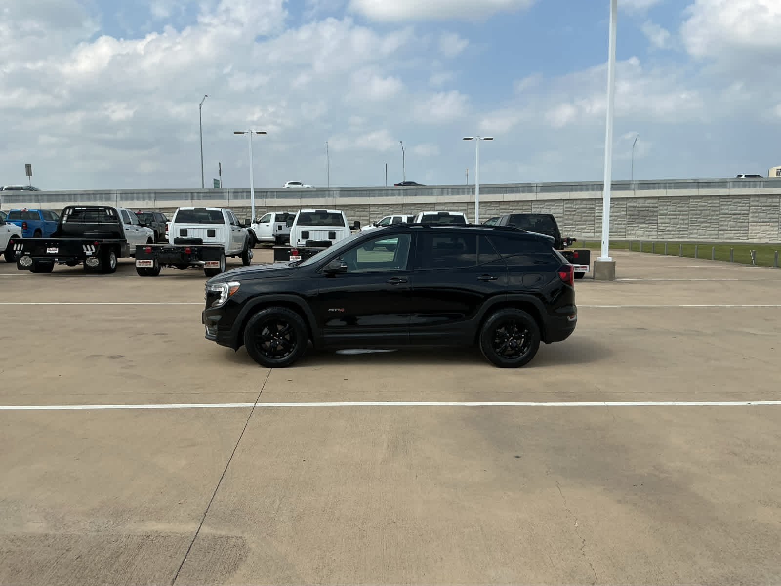 Used 2023 Ebony Twilight Metallic GMC AT4 image 10