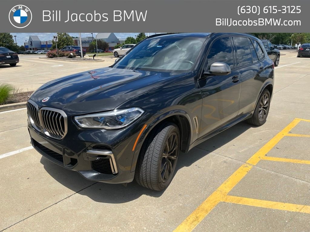 Used 2023 Black Sapphire Metallic BMW M50i image 1
