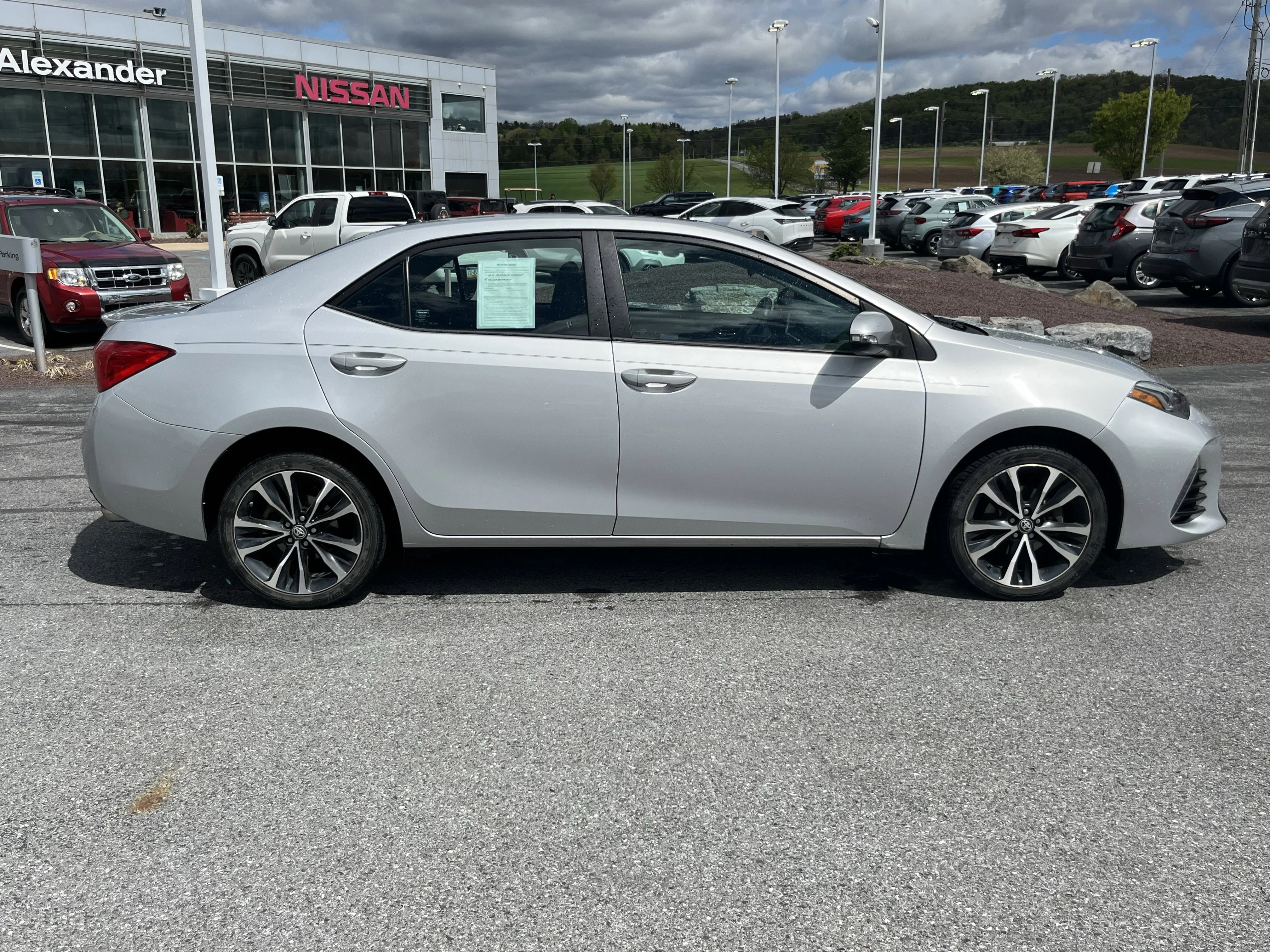 Used 2018 Classic Silver Metallic Toyota SE image 2