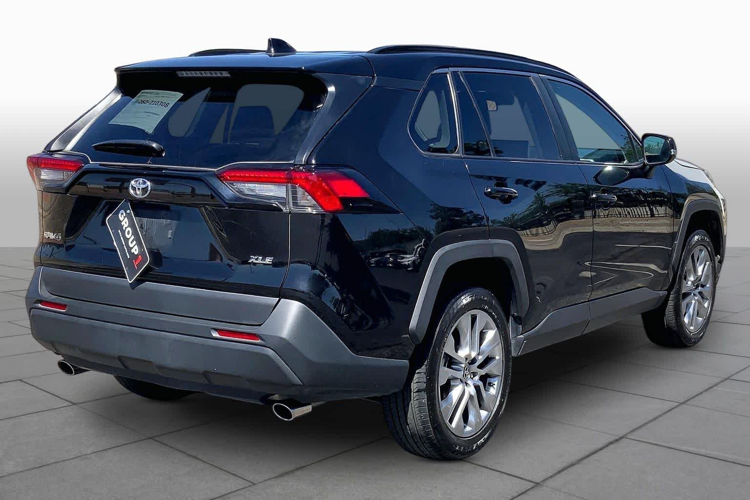 Used 2025 Midnight Black Metallic Toyota XLE Premium image 12