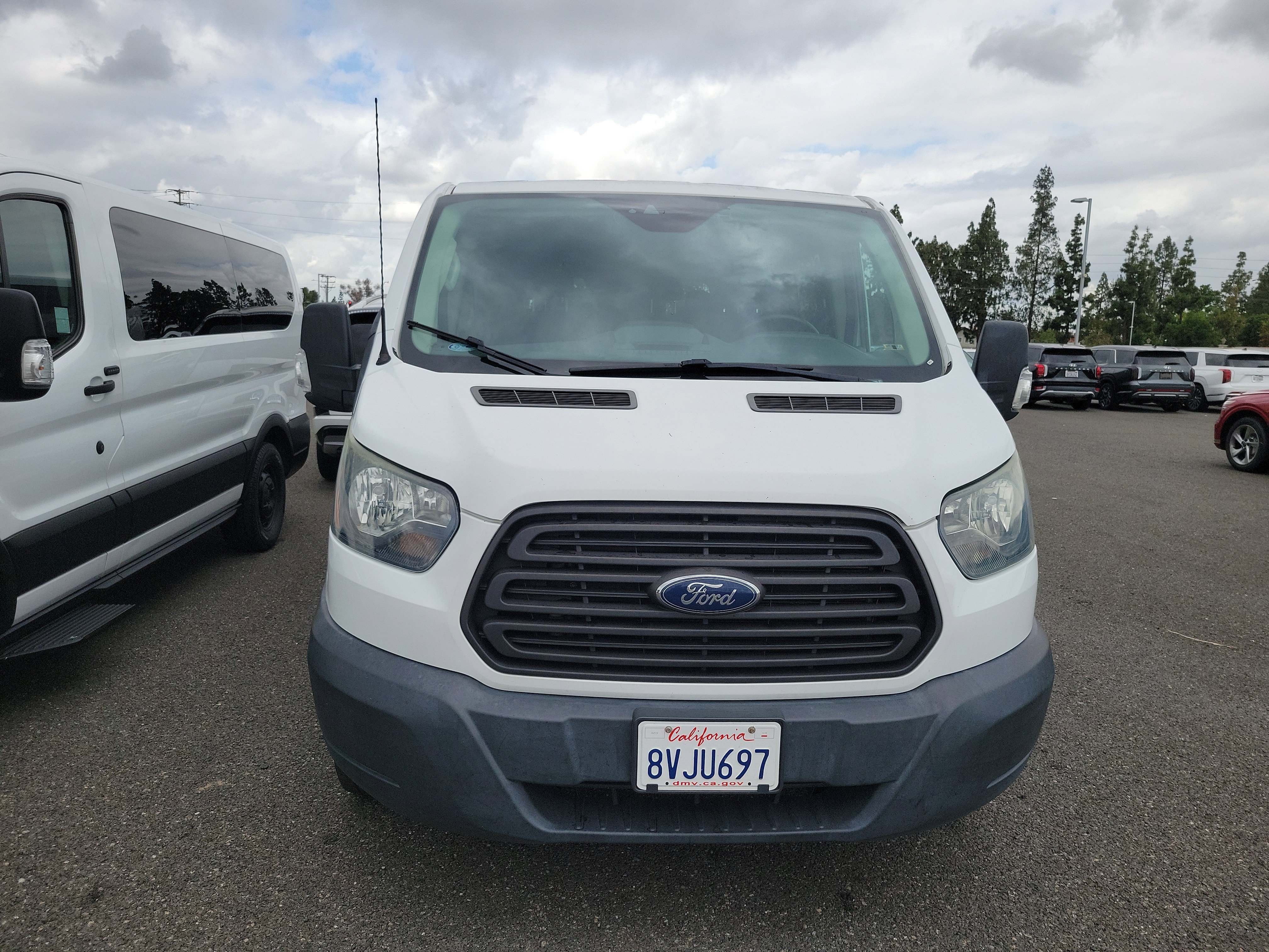 2016 Ford Transit 150 XL Wagon Low Roof Sliding Pass. 130's photo