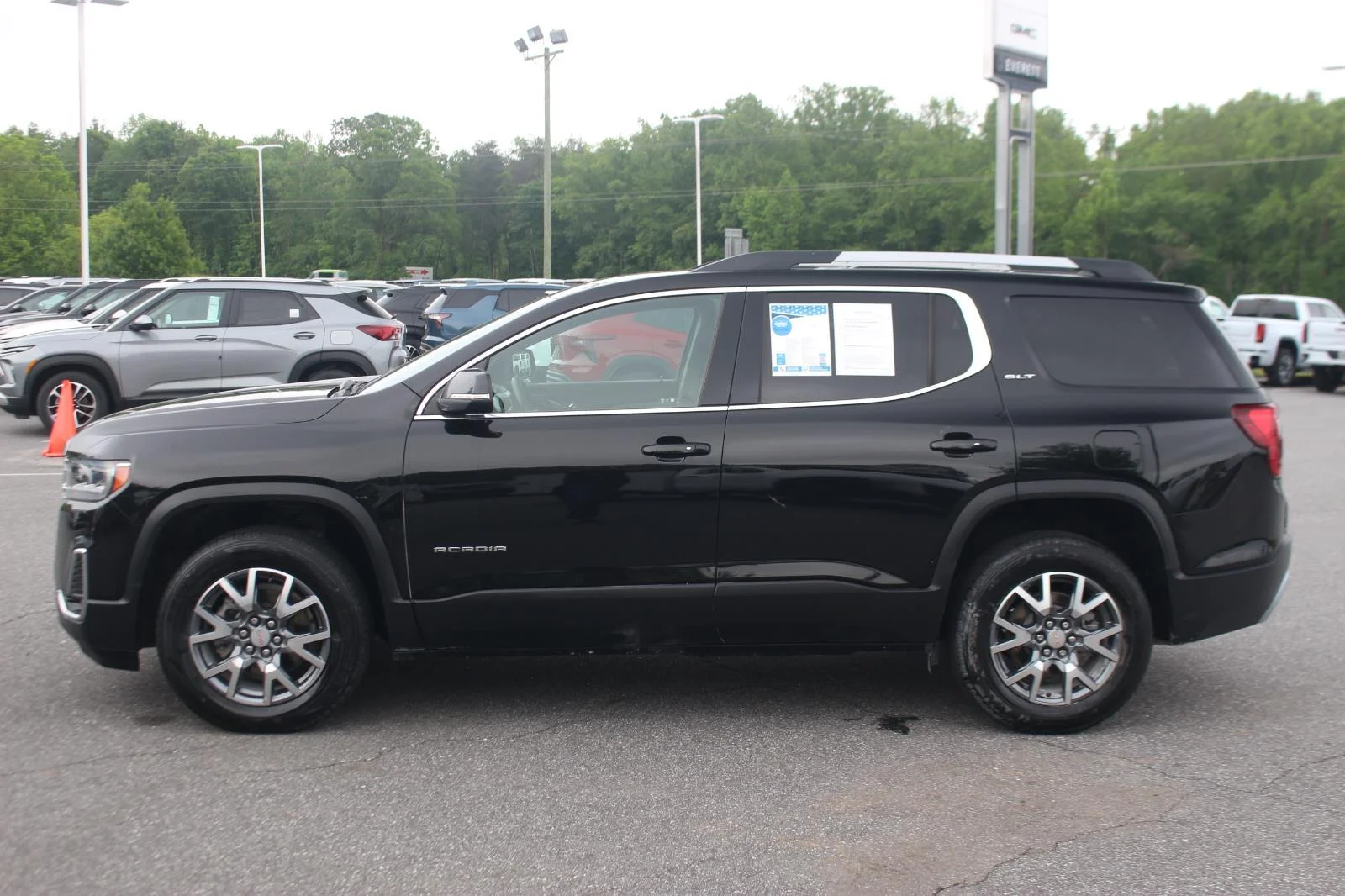 Used 2023 Ebony Twilight Metallic GMC SLT image 4