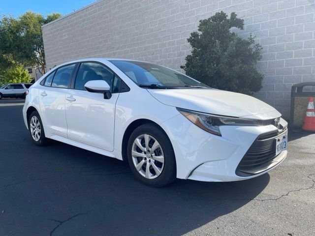 Used 2025 White Toyota LE image 1