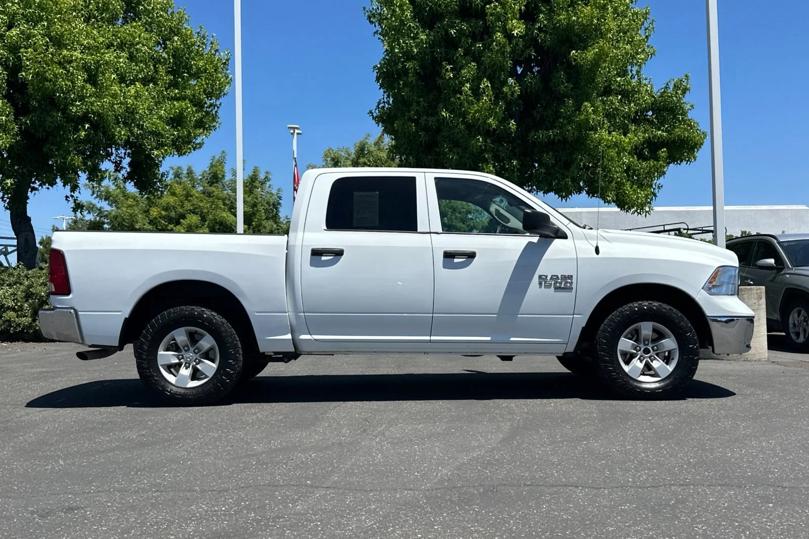 Used 2023 Bright White Clearcoat Ram SLT image 3