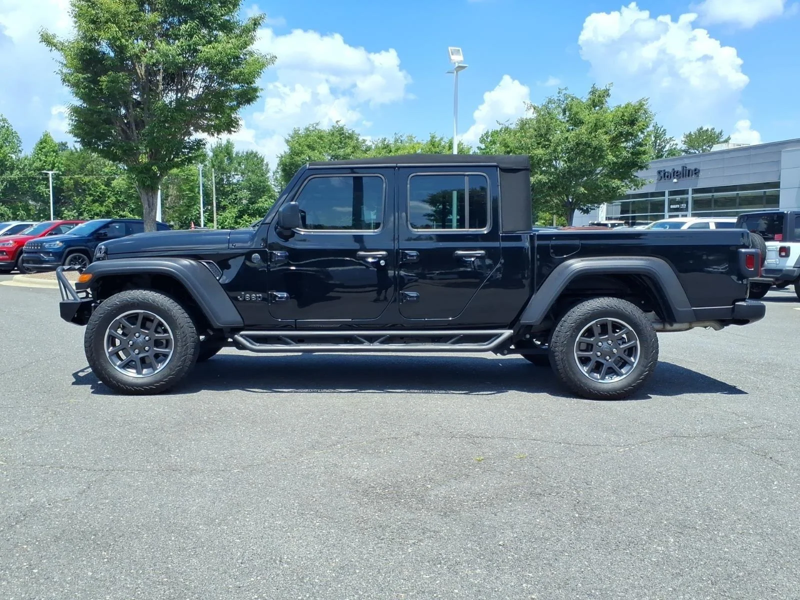 Used 2024 Black Clearcoat Jeep Sport image 3