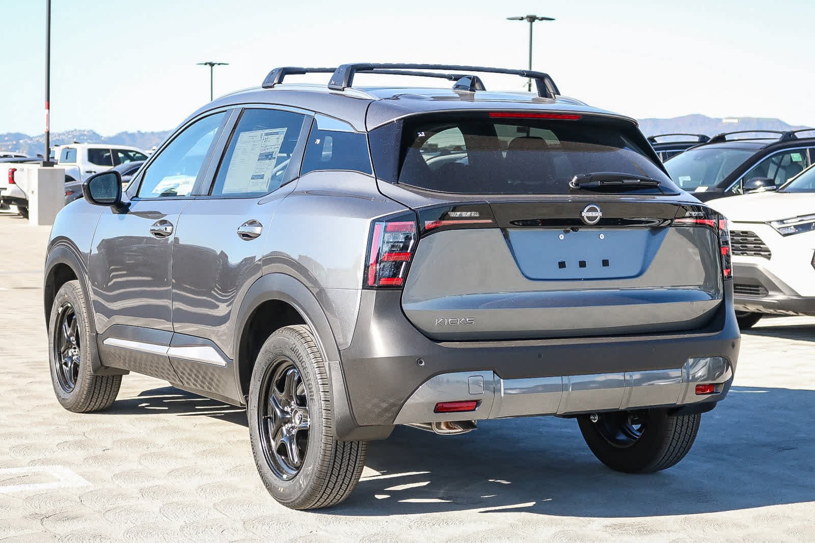 New 2027 Gun Metallic Nissan SV image 8
