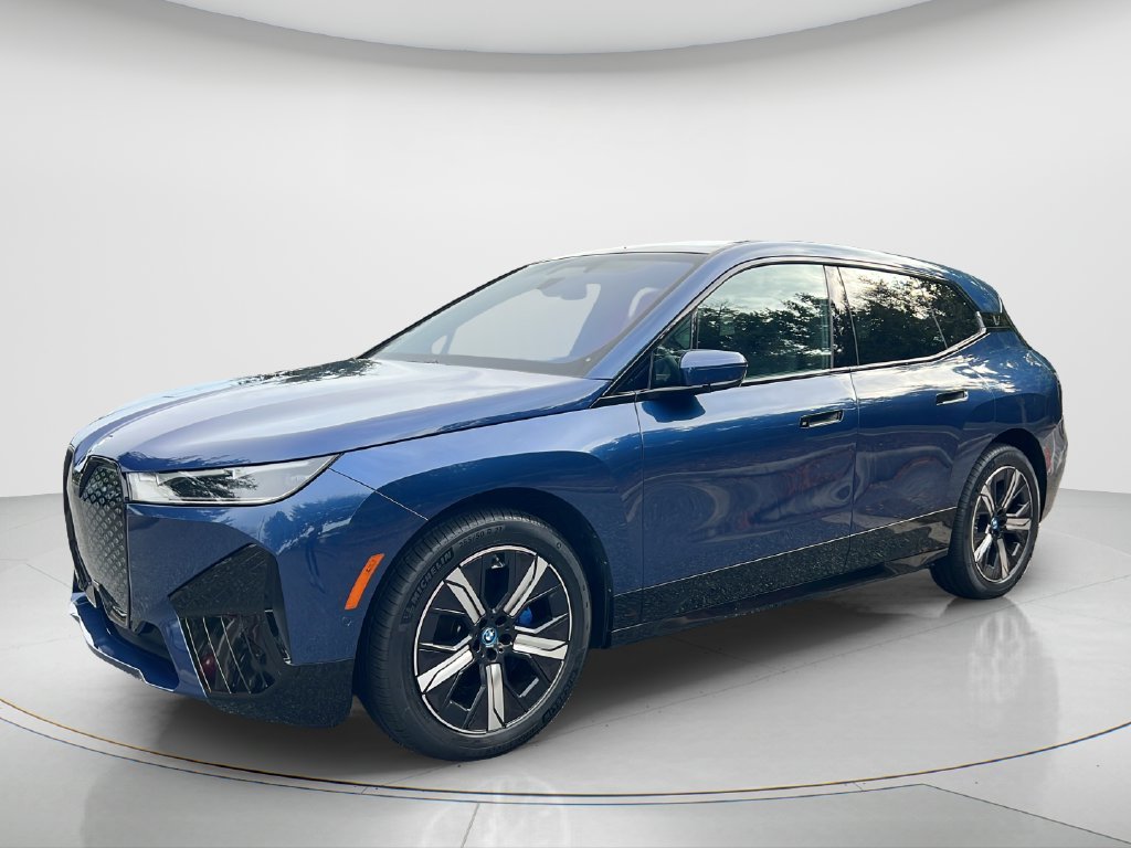 Certified Used 2024 Blue BMW xDrive50 image 1