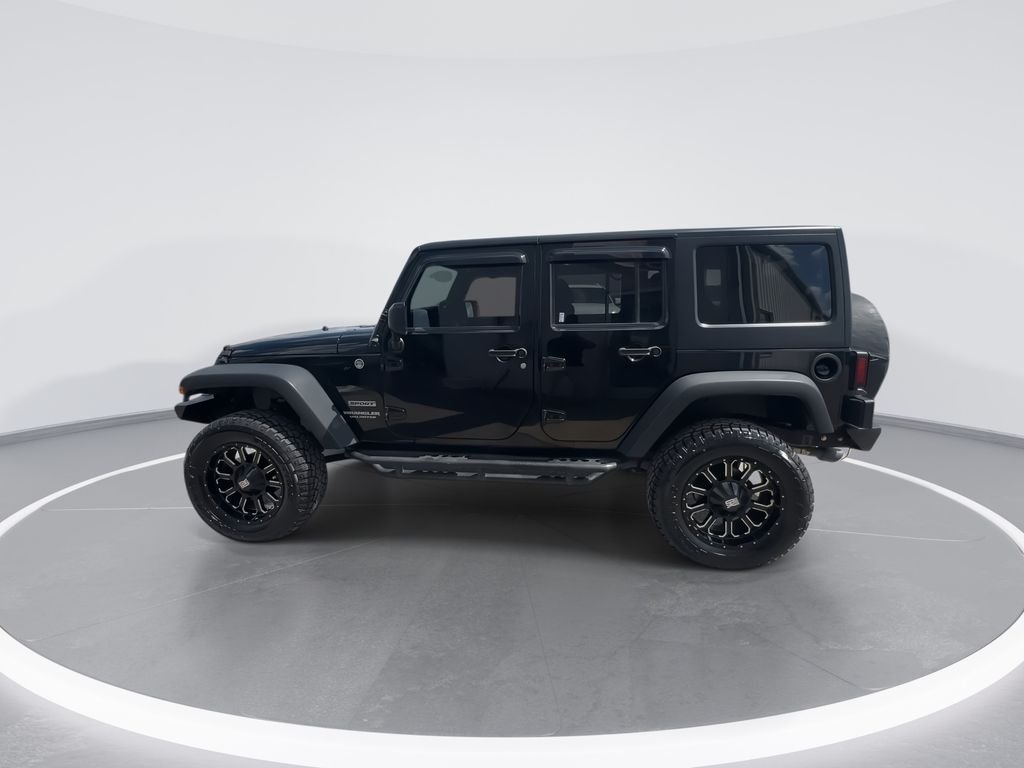 Used 2015 Black Jeep Unlimited Sport image 5