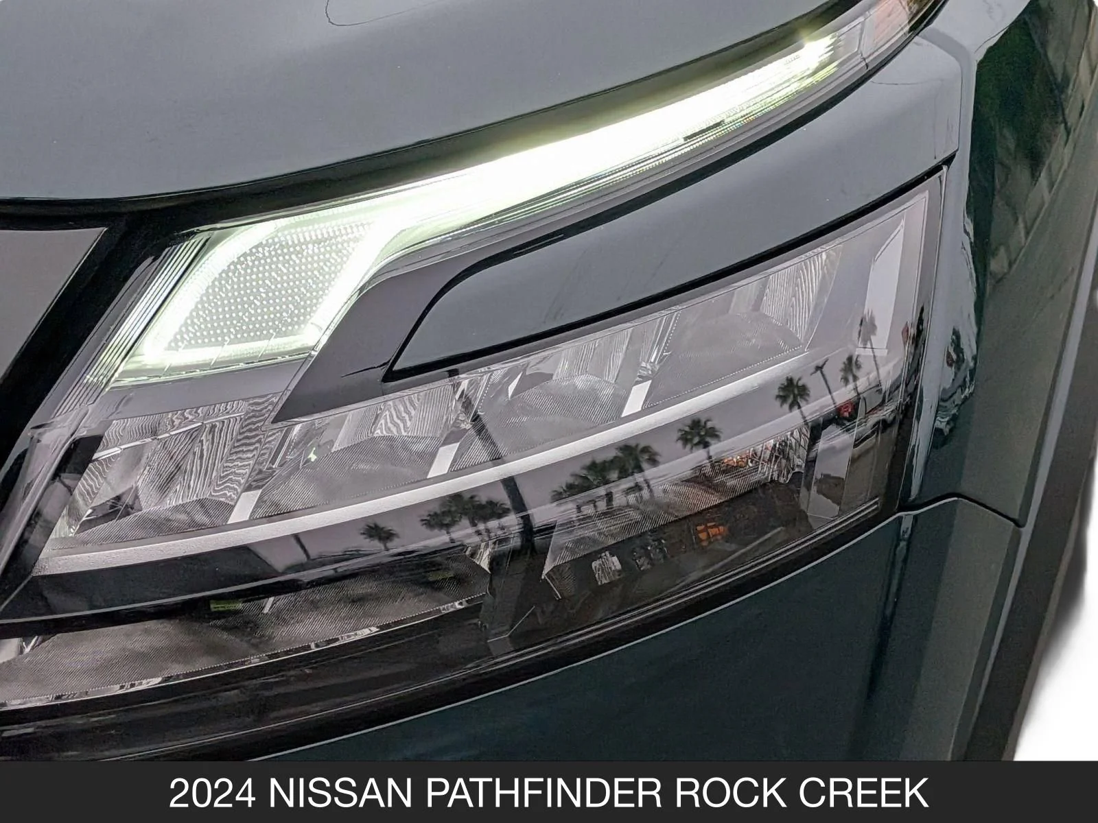 Used 2024 Obsidian Green Pearl/Super Black Nissan Rock Creek image 10