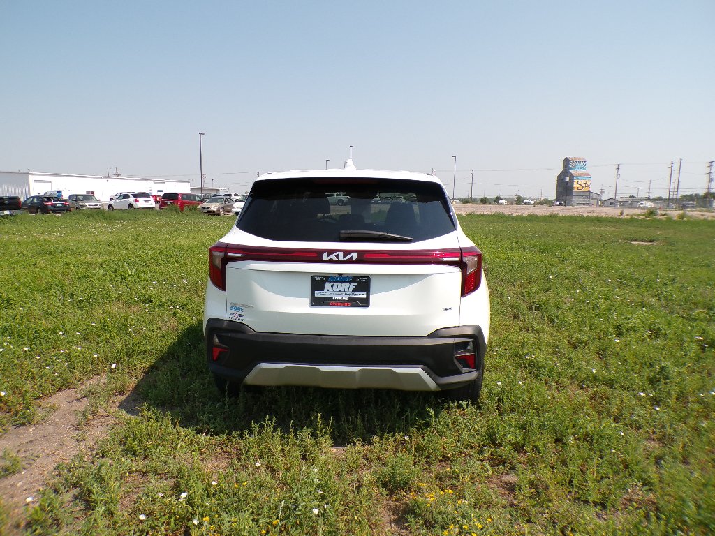Used 2026 Snow White Pearl Kia LX image 6