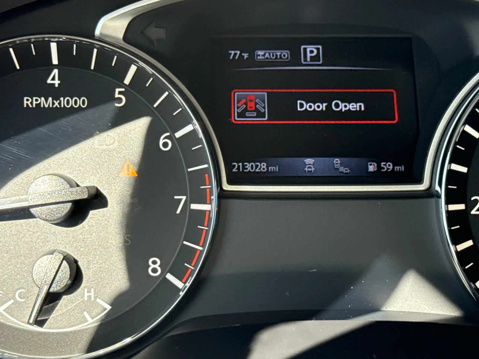 Used 2017 Magnetic Black Metallic Nissan Platinum image 12