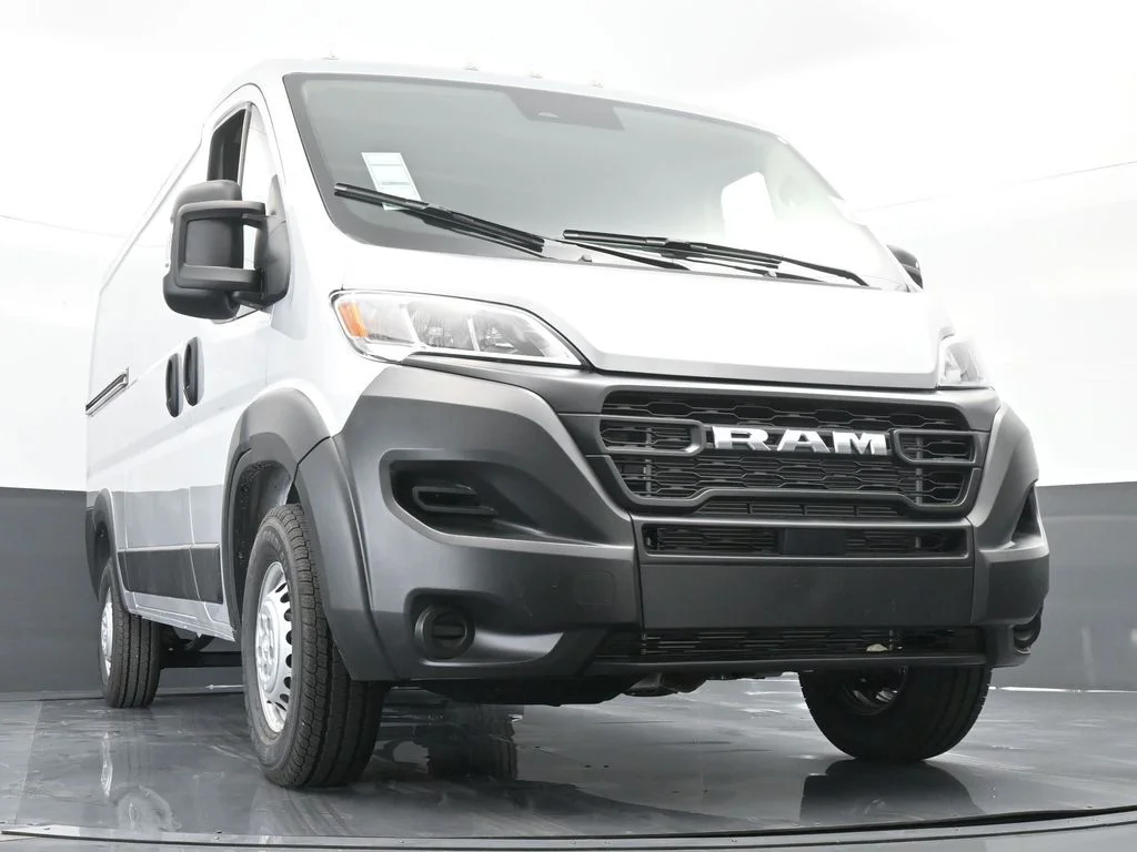 Used 2025 Bright Silver Clearcoat Metallic Ram Low Roof image 55