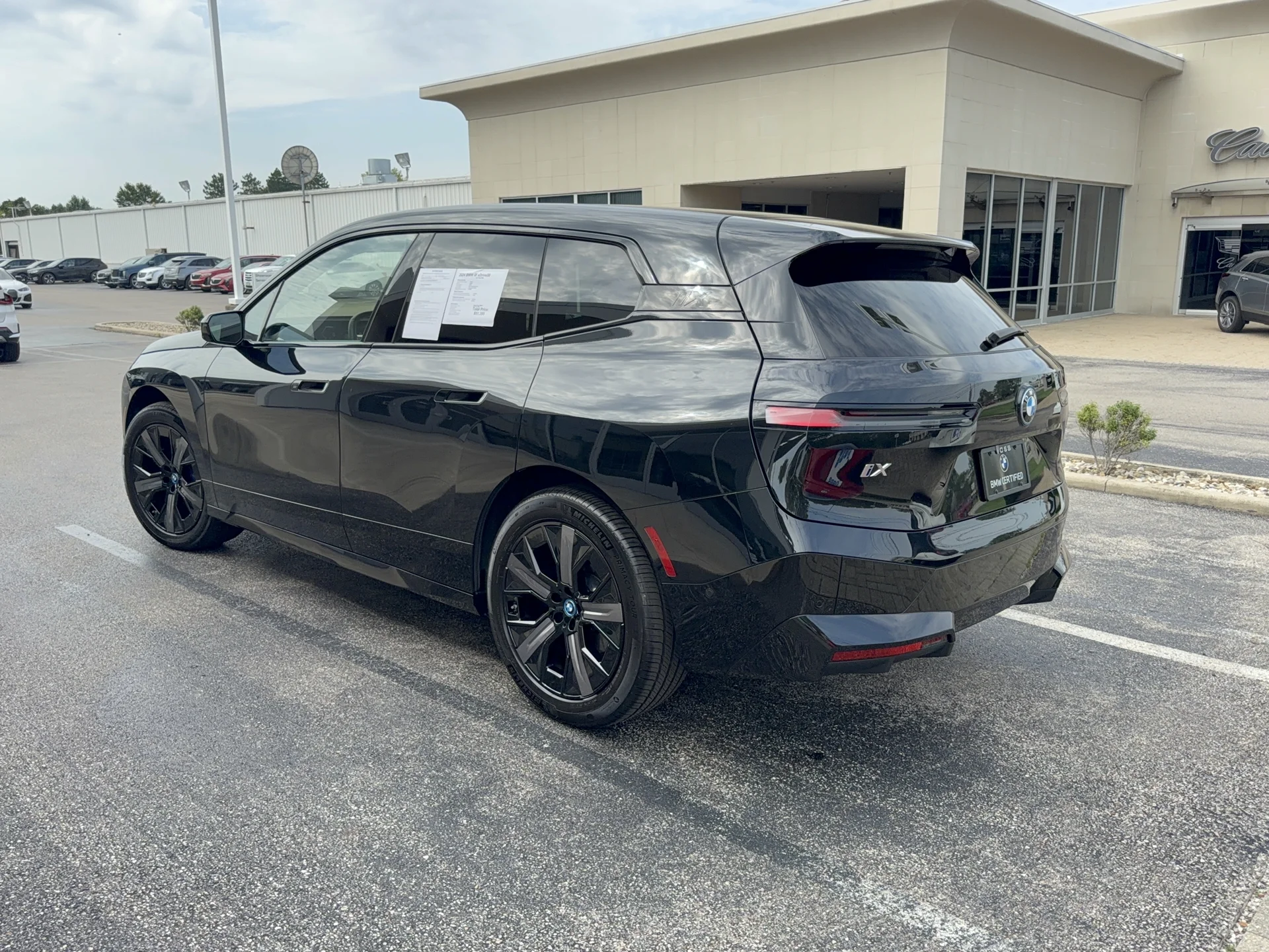 Certified Used 2024 Black Sapphire Metallic BMW xDrive50 image 6