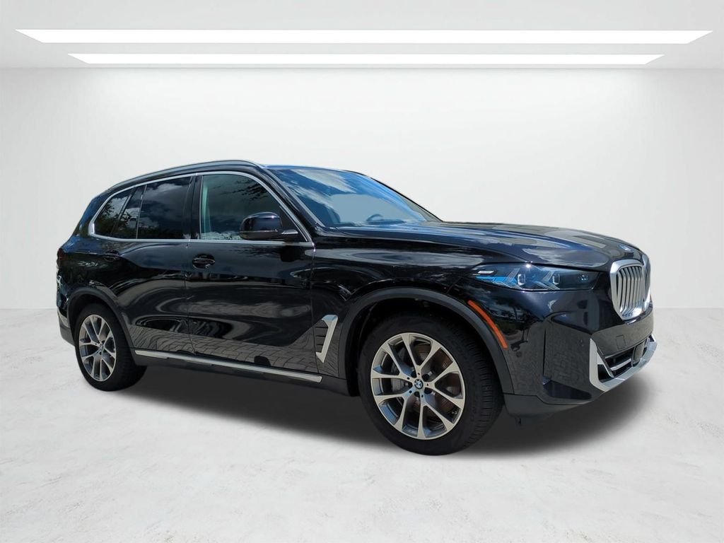 New 2026 Black Sapphire Metallic BMW xDrive50e image 2