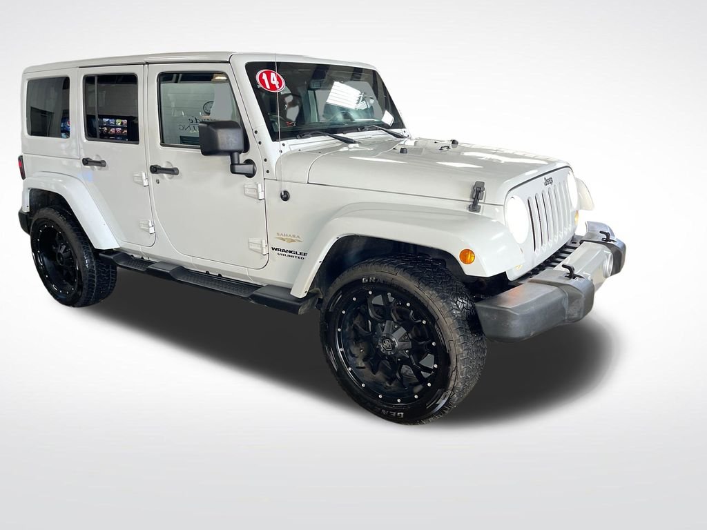 Used 2014 White Jeep Unlimited Sahara image 9