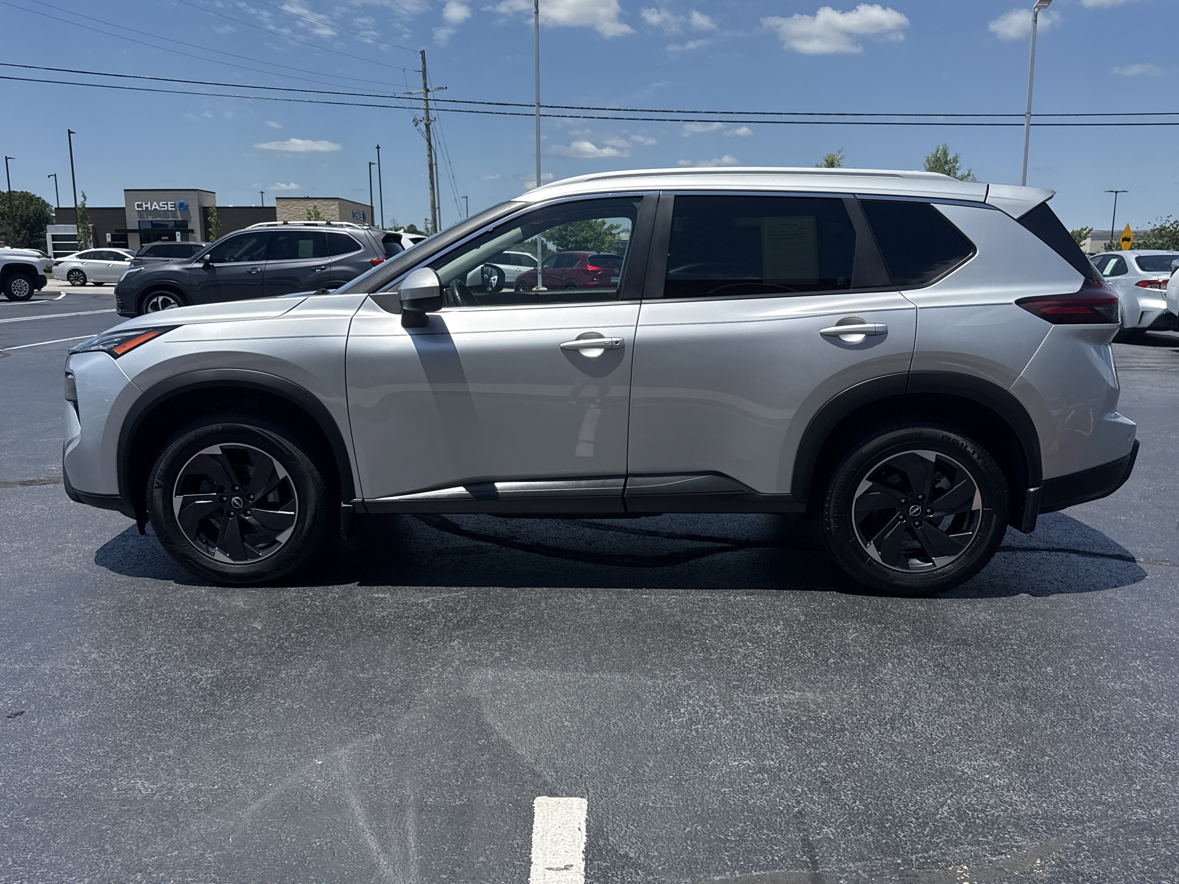 Used 2024 Brilliant Silver Metallic Nissan SV AWD image 12