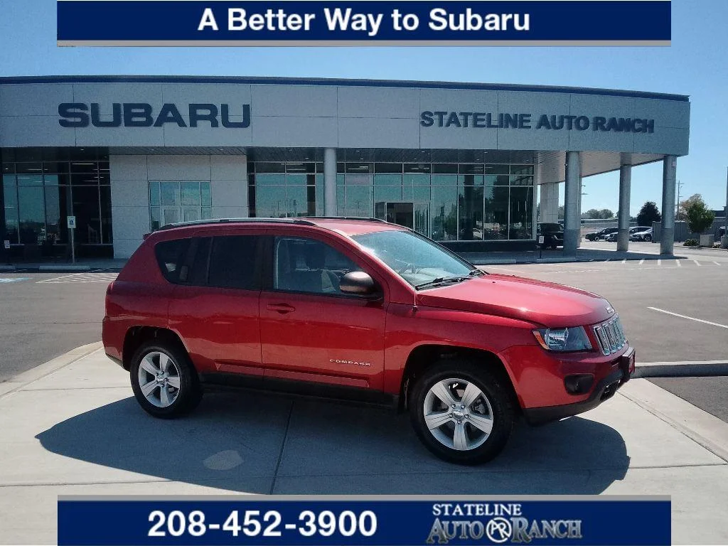 Used 2016 Deep Cherry Red Crystal Pearlcoat Jeep Sport image 1