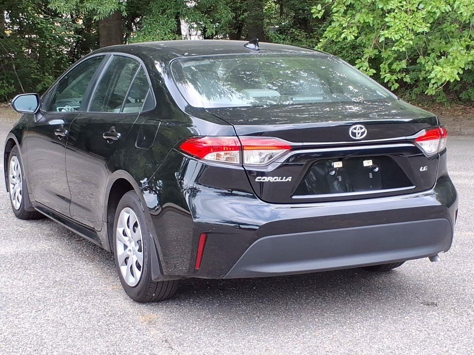Used 2025 Midnight Black Metallic Toyota LE image 14