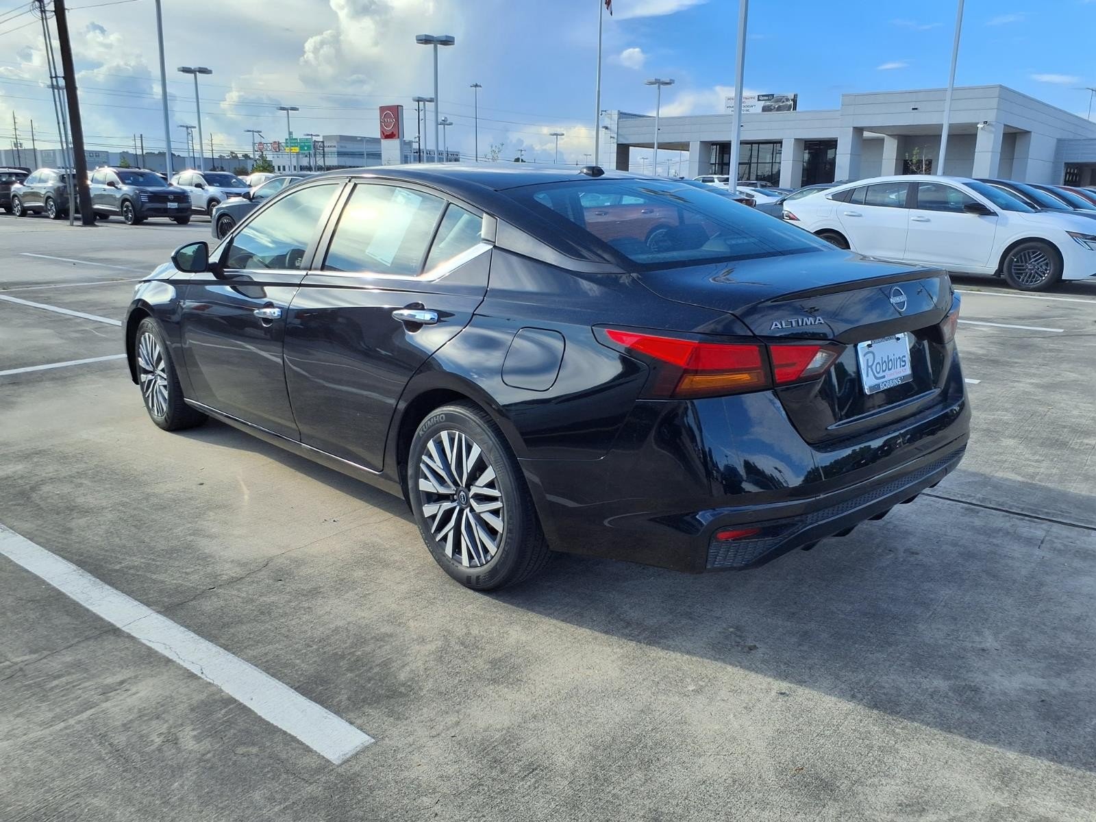 Used 2024 Super Black Nissan 2.5 SV image 2