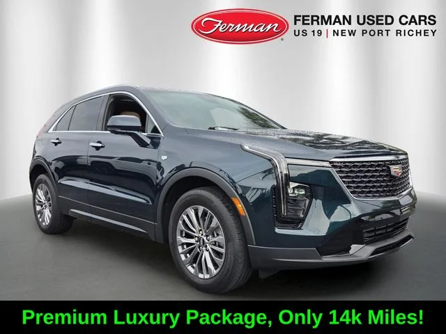 Used 2025 Green Cadillac Premium Luxury image 1