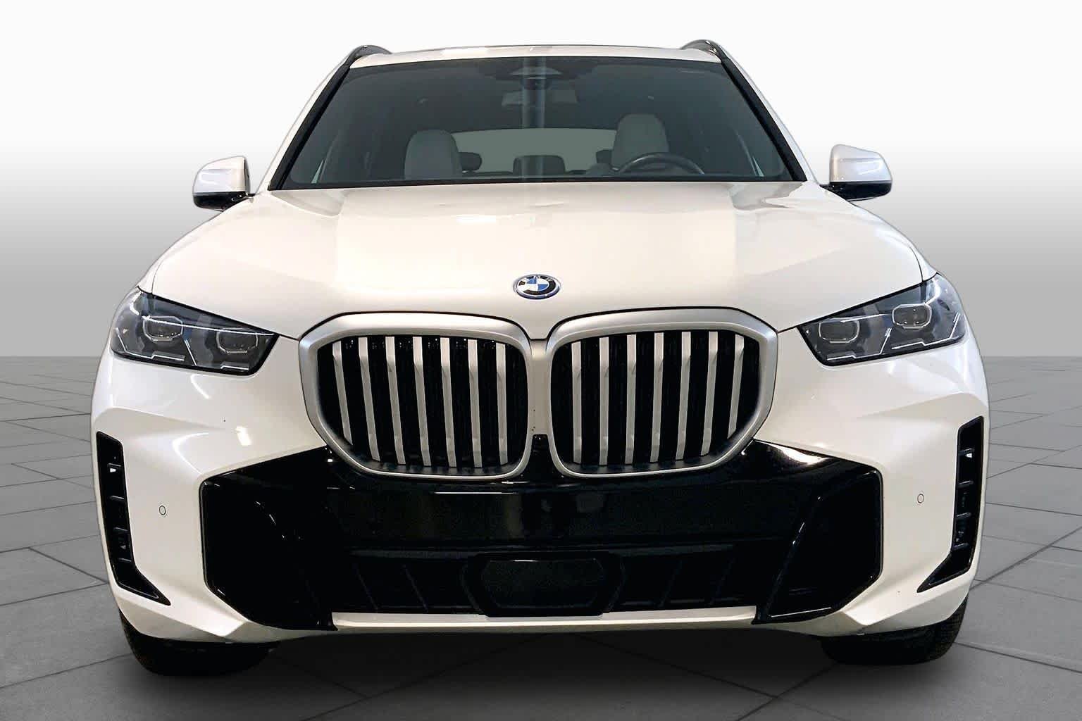 Used 2024 Mineral White Metallic BMW xDrive50e image 3