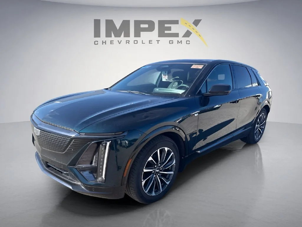 Used 2024 Emerald Lake Metallic Cadillac Sport 2 image 1
