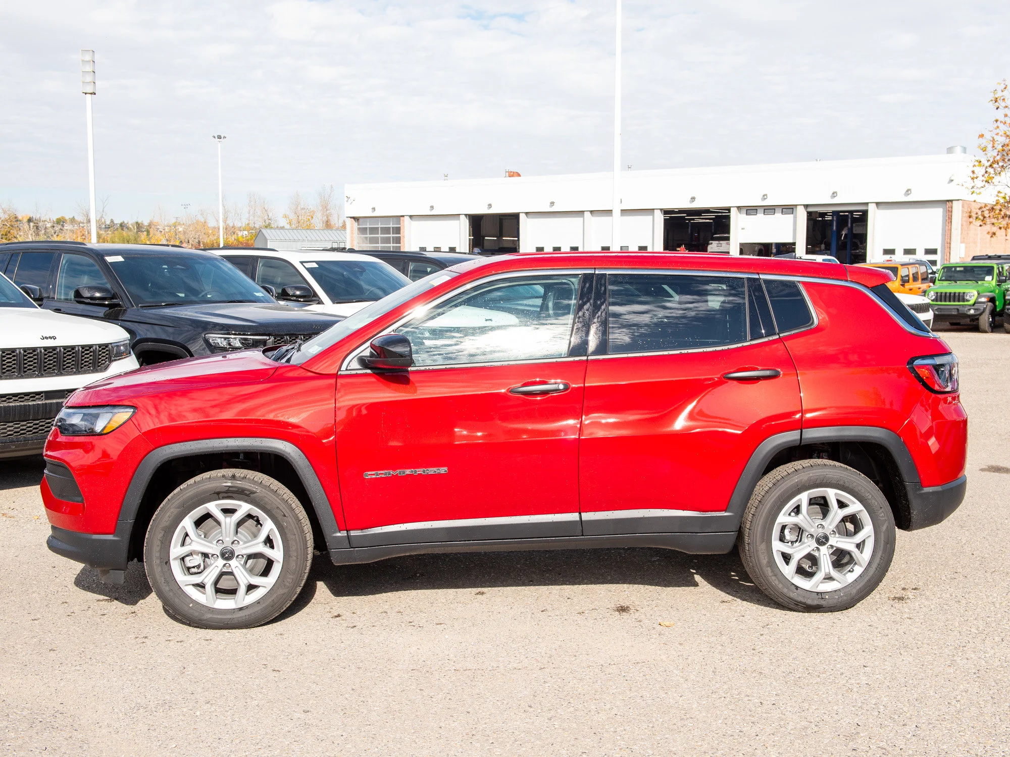 New 2026 Red Jeep Sport* image 2