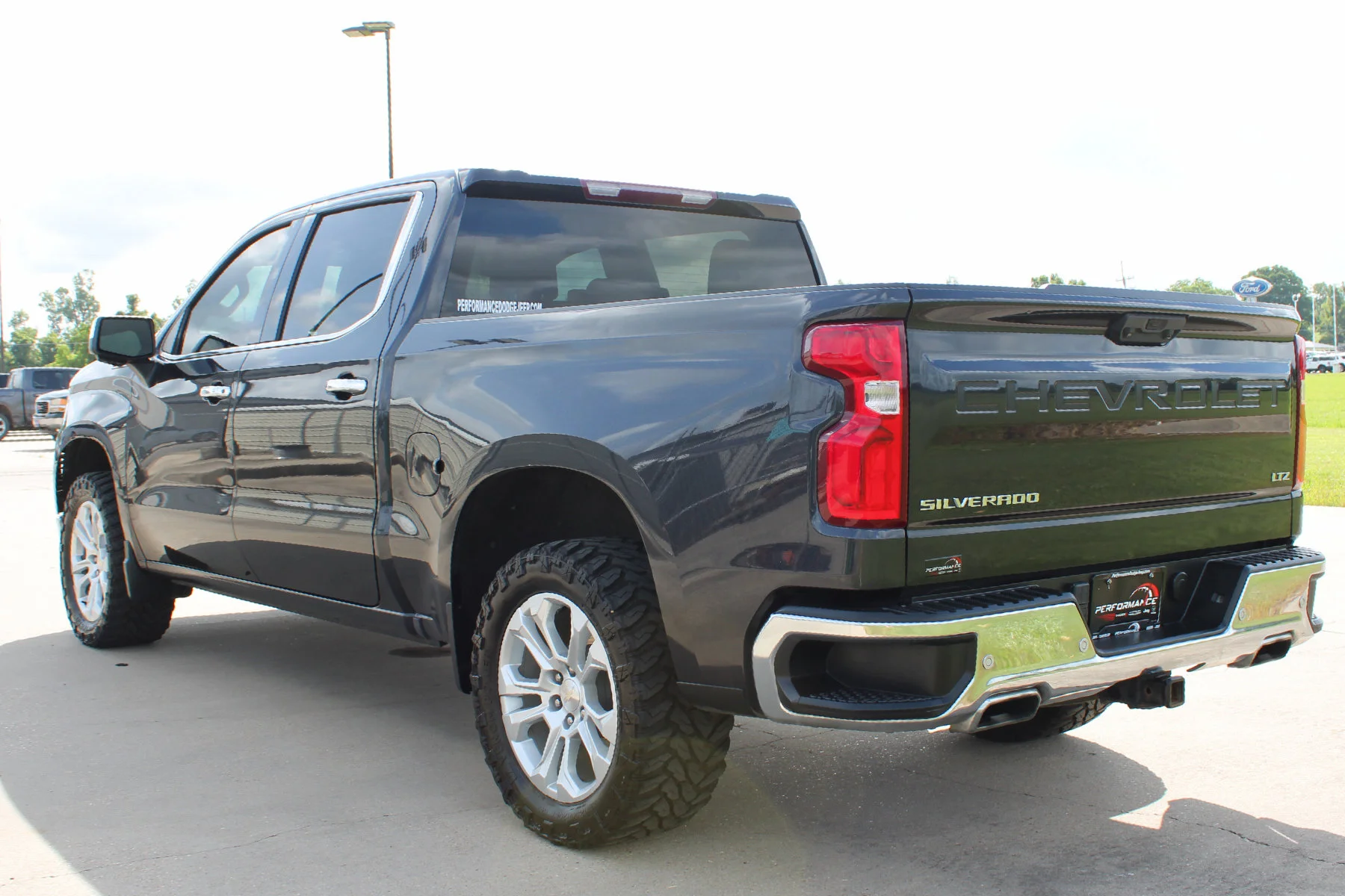 Used 2023 Dark Ash Metallic Chevrolet 4WD Crew Cab 147 LTZ image 35