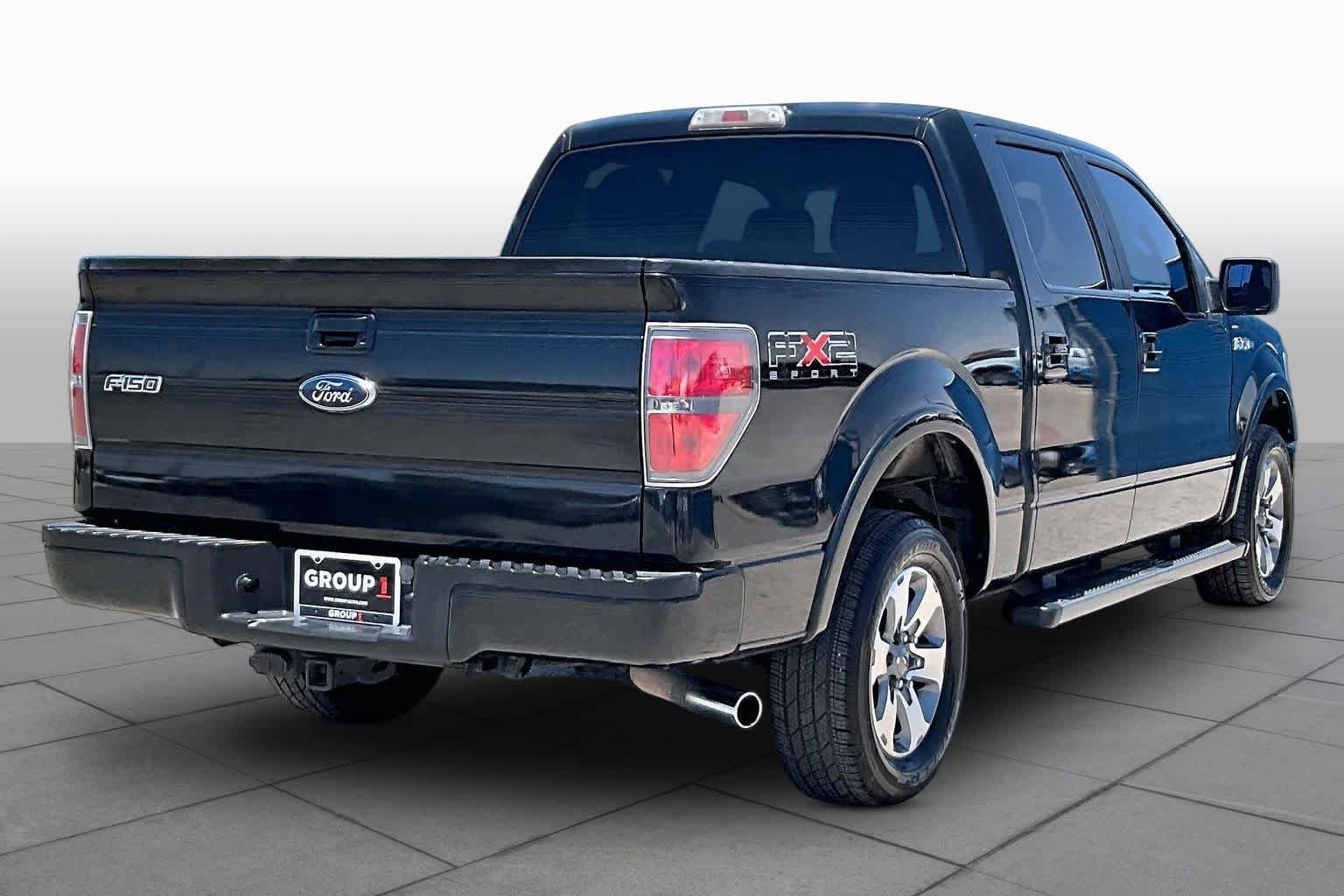 Used 2010 Tuxedo Black Ford XLT image 11
