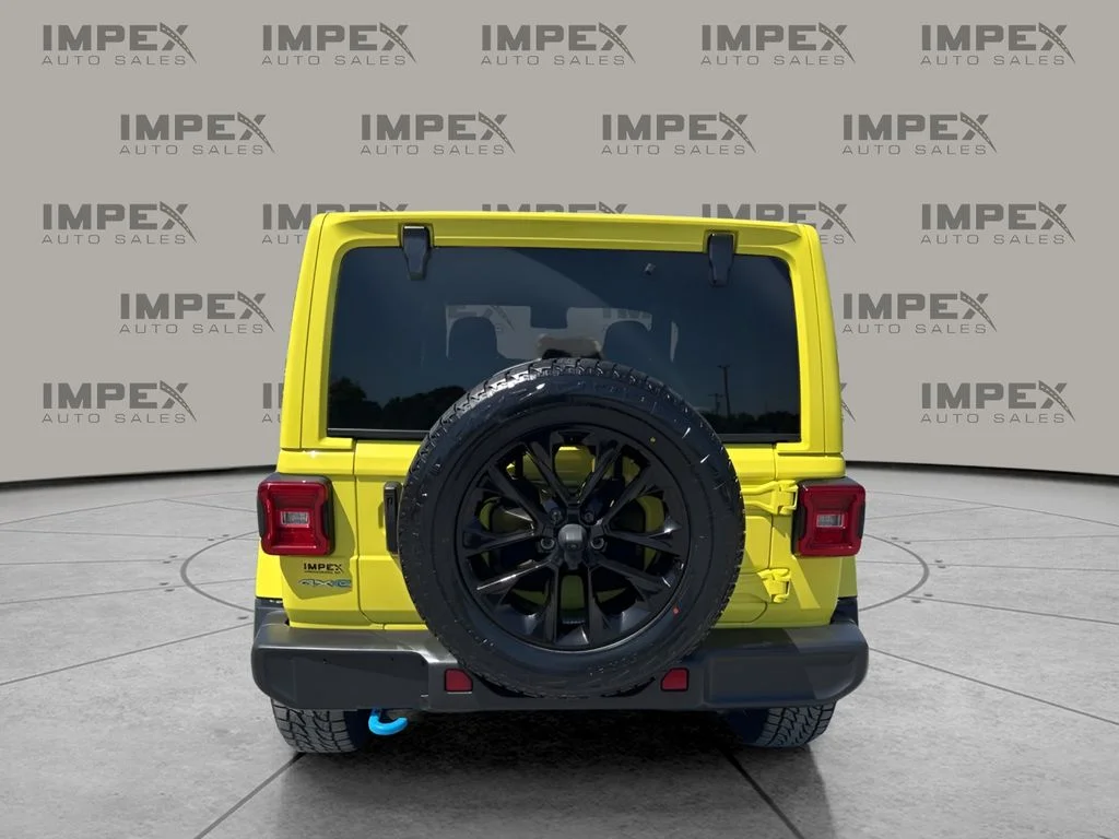 Used 2024 Yellow Jeep Sahara 4xe image 4